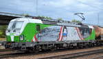 SETG mit der ELL Vectron   193 219  [NVR-Number: 91 80 6193 219-3 D-ELOC] und einem Kesselwagenzug (Kreideschlamm, leer) am 20.08.18 Bf. Flughafen Berlin-Schönefeld.