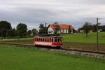 B4ET 23 111, als Kurs 115, vor Hp Gmunden Lembergweg am 12.10.2011 