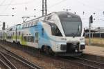 Zug WB 9509 von Freilassing nach Wien Westbahnhof mit dem 4010 102-0 als letztes Fahrzeug am 25.August 2013 im Bf.