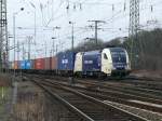 ES 64 U-035 durchfhrt mit einem langen Containerzug Kln-Gremberg in Nord-Sd-Richtung. Aufgenommen am 28/02/2009.