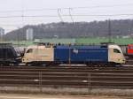 ES 64 U2-023 von der Wiener Lokalbahn AG steht am 27.01.2010 vor 185 564-2 von MRCE in Aachen West.