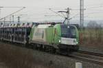 1216 954  HDLMAYR  der Wiener Lokalbahn mit einen Dacia-Autozug bei Iphofen am 29.03.2012    