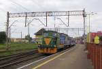 PCC Rail 401Da-324 zieht die PKP IC EU07-303 und den TLK 38260 aus Przemysl Gl. am 31.05.2014 in die Abstellgruppe in Swinoujscie.