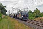 370 055 der Cargo Unit führte für Freightliner PL am 04.07.23 einen Transcereal durch Wittenberg-Labetz Richtung Falkenberg(E).