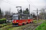 Konstal 105Na Wagen 456 auf der Linie 19 von  Katowice Plac Miarki  Richtung  Stroszek Zajezdnia  fahrend auf dem berland-abschnitt zwischen  Dąbrowa Miejska Węglowa  und  Dąbrowa