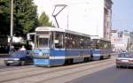 Tram 2458 ist hier auf der Linie 11 in Richtung Wroclaw Glowny unterwegs. 
Die Aufnahme entstand am 28.6.2004 in Nhe des Hotels Holiday Inn in Breslau.