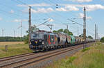 370 061 der Cargounit schleppte für ihren Mieter Freightliner PL am 14.07.24 einen Transcereal-Zug durch Wittenberg-Labetz Richtung Dessau.