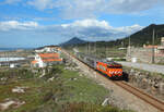 2626 approaches Ancora Praia whilst working IR854, 1425 Valenca - Porto Campanha, 21 March 2022