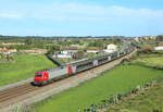 5615 passes Salreu whilst working IC730, 0650 Valenca - Lisboa Santa Apolonia, 21 March 2022