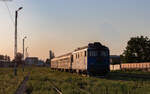 60 1355 mit dem R 5468 (Piatra Neamt - Bacau) im Bahnhof Buhusi 14.8.24