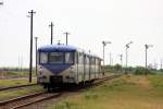 Vierteilig fhrt eine ehemalige Deutsche Reichsbahn Triebwagen Garnitur  aus dem Bahnhof Crpinis in Rumnien am 11.5.2010 nach Timisoara aus.