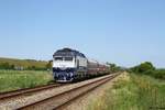 64 0920 am 30.06.16 mit dem IR1833 von Iasi nach Timisoara Nord bei Huedin.