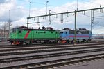 Am 01.06.2015 standen GC Rc4 1288 und GC Rc4 1166 (ex. AMTRAK X995) zusammen abgestellt im neuen Bahnhof von Kiruna und warten auf ihren nächsten Einsatz.