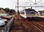 3144 mit Regionalzug 3075 Gteborg-Kungsbacka auf Bahnhof Kungsbacka am 15-7-2000.