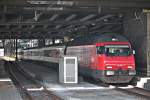 Ausfahrt am 25.10.2014 von Re 460 115-9  Heidiland  mit einem InterRegio aus Basel SBB gen Osten/Süden.