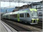 Der neue BLS Triebzug RABe 535 101  Ltschberger  bei einer Testfahrt im Bahnhof von Spiez am 29.07.08. Die Berge im Hintergrund spiegeln sich auf der Seite des Zuges wieder. (Hans)