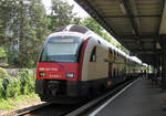 RABe 514 015-7 als S14 in Zürich Wipkingen am 13.06.2014. Gegenwärtig wird dieser Bahnhof umgebaut. Den hier zu sehenden Inselbahnsteig gibt es nicht mehr. Als Ersatz entstehen zwei Seitenbahnsteige, wovon einer bereits fertiggestellt ist. 