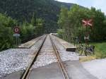 Schienenauszug an einem Werksgleisanschluss bei Steg im Wallis (24.05.2009).
Der Rhone-Radweg zwischen Visp und Leuk kreuzt den Werksgleisanschluss mit dieser  Schienenbesonderheit .