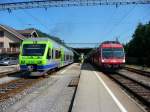 bls - Triebzzug RABe 525 029-5 neben Triebwagen RBDe 4/4  566 235-8 im Bahnhof Ramsei am 07.09.2012