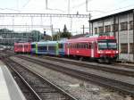 bls - Einfahrender Zug mit dem Steuerwagen ABt 50 85 80-35 941-6 an der Spitze im Bahnhof Burgdorf am 17.09.2012