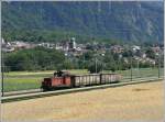 Eine Em 3/3 mit zwei Eaos (Schrott aus Untervaz) auf dem Weg nach Landquart bei Zizers.