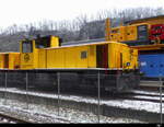 Marti Tunnel AG - Lok Emf 98 85 5 831 000-5 ( ex SBB Em 3/3 ) abgestellt im Areal von Marti Tunnel AG bei Klus am 13.01.2024 .. Standort des Fotografen auf einem Radweg 