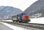 SBB Cargo Kleinlok 232 216-2 ist auf dem 3-Schienengleis der RhB mit einem ged.