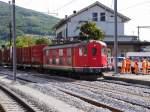 OeBB - Re 4/4  10009 mit Güterzug im Bahnhofsareal von Oensingen am 14.08.2014