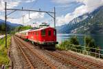 Ex SBB Re 4/4 10009 kommt vor Unterterzen am Walensee in Richtung Landquart  mit dem TEE Rheingold-Zug vorbei.