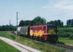 MThB: MThB Ae 477, ehemals DR BR 142 mit einem Güterzug bei Berg im August 1995.
Foto: Walter Ruetsch