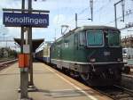 Re 4/4 II 505 bls mit einer Ersatzkomposition als RE Luzern-Bern beim Halt in Konmolfingen am 02.05.2008