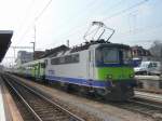 BLS - Schnellzug von Bern nach Luzern mit der Re 4/4 420 502-4 im Bahnhof Konolfingen am 09.04.2010