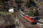 420 11195 mit IR 2182 bei Wassen (26.03.2007)