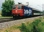 SBB: Re 4/4II 11322 als Werbelokomotive für das Halbtax-Abonnement  2 x 150 = 222 ?  zwischen Niederbipp und Wangen an der Aare im Jahre 1998.
Foto: Walter Ruetsch