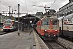 RE4970 mit 511 029 nach Wil und IR2270 mit der Re 4/4 II 11109 nach Basel SBB in St.Gallen.