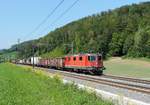 Tecknau - 30. August 2019 : Wegen Lok Mangel bei SBB Cargo werden Loks von SBB Reiseverkehr vor Güterzüge eingesetzt. Hier die Re 4/4 II 11133 mit einem Gemichten in Richtung  Olten.