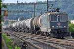 Re 420 330-3 unterwegs mit einem Kesselzug bei Brugg Nord in Richtung Basel am Morgen des 23.05.2020.