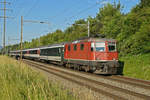 Re 4/4 II 11124 fährt Richtung Bahnhof Kaiseraugst.