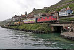 Re 4/4 II 11331 (420 331-1) fährt mit einem Schiebewandwagen und Nivellier-Richt-Stopfmaschine Matisa B 45 UE (BNA 341 | 99 85 91 22 001-2 CH-SCHEU) vorbei am Plage de la Lisette in