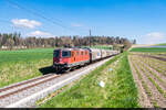 Am 16.04.2022 ist SBB Cargo Re 420 339 unterwegs als CargoExpress von Schönbühl SBB nach Estavayer-le-Lac und konnte hier bei Ferenbalm aufgenommen werden