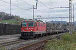 Re 420 118-2 durchfährt am 11.03.2024 den Bahnhof Gelterkinden.