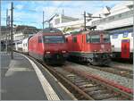 Bei den vielen Triebwagen ist es heut shon fast ein Glückfall zwei E-Loks auf ein Bild zu bekommen....
In Lausanne verlässt der IR 90 nach Brig mit einer SBB Re 460 den Bahnhof, während die SBB Re 4/4 II 11248 (Re 420 248-7) auf die Blockstianz zum ausfahrenden IR90 für die Weiterfahrt wartet. 

17. Oktober 2024