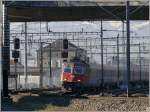 Re 4/4 II 11221 mit EC Vorarlberg nach Wien Westbf biegt auf die Verbindunkslinie nach Trbbach und Buchs SG ein.