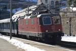 Re 4/4 II 11197 mit IR 2267 bei der Einfahrt in den Bahnhof Gschenen, am 18.2.08.