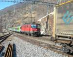 RE 3268 auf der Fahrt von Brig nach Spiez mit SBB Re 4/4 II n 11250 und BLS EW III in Lalden am 16. Februar 2008. 