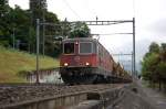 Re 4/4 11289 mit einem Schotterzug bei Villneuve am 06.06.2008