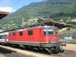 Re 4/4 11155 vor dem IR nach Chiasso am 5. Juli in Bellinzona