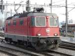 SBB - Re 4/4 11203 bei einer Rangierfahrt im Bahnhofsareal von Buchs/SG am 13.04.2008