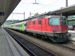 SBB - Re 4/4 11254 zu Gast bei der bls im Bahnhof von Spiez am 16.08.2008