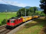 Re 4/4 II 11272 mit Postzug bei Wangen a.A.